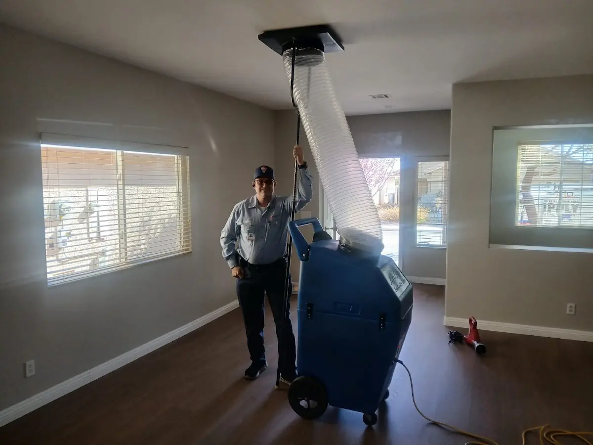 Professional Dryer Vent Cleaning work inside a Fraser home